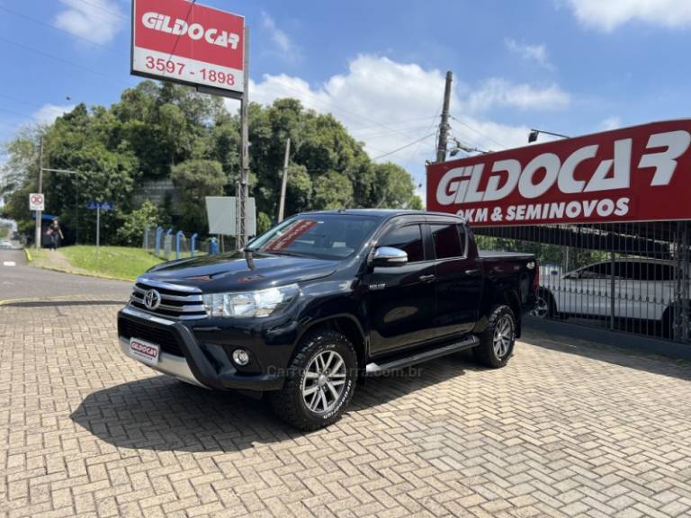 TOYOTA - HILUX - 2017/2017 - Preta - R$ 188.900,00